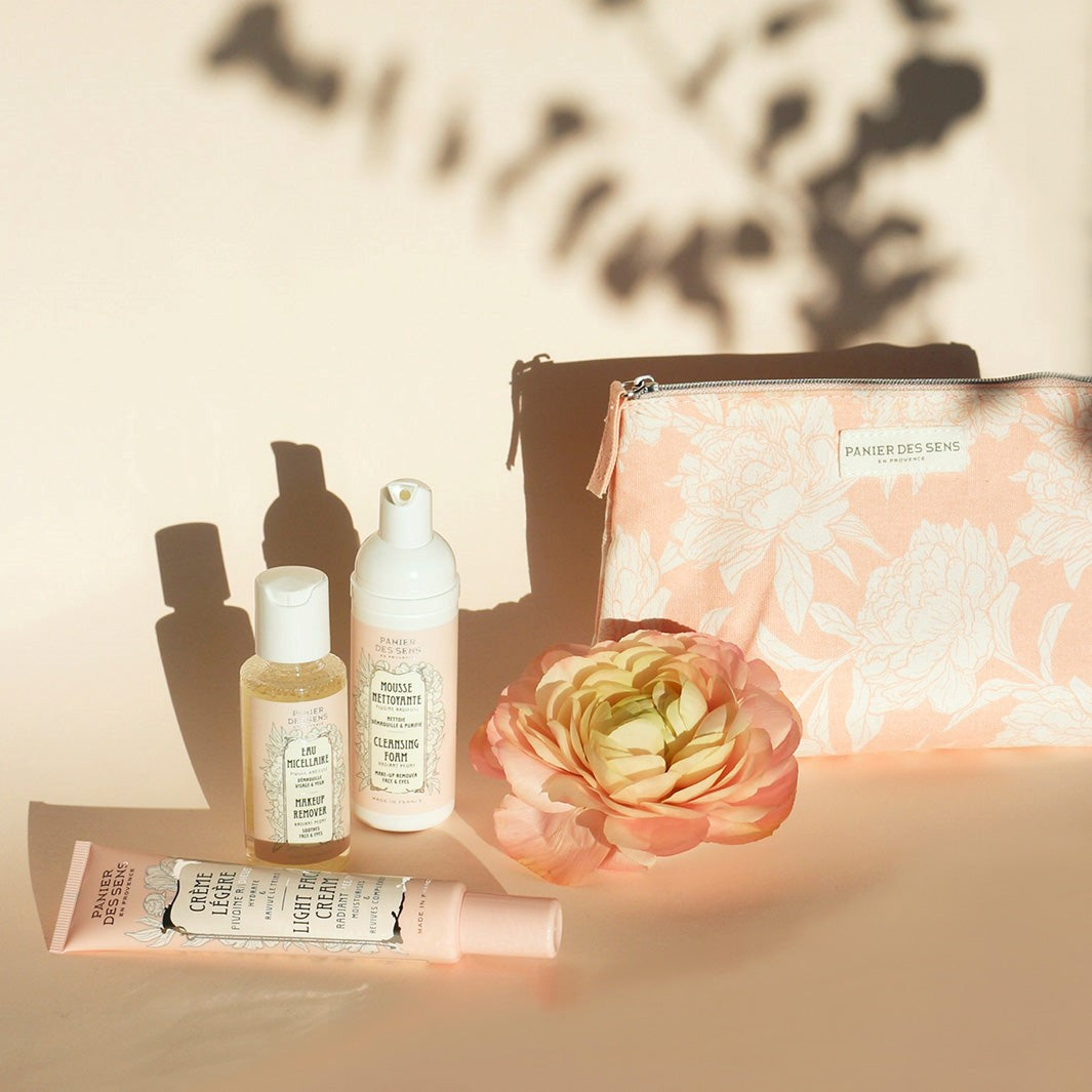 Toiletry bag with micellar water, cleansing mousse and light day cream